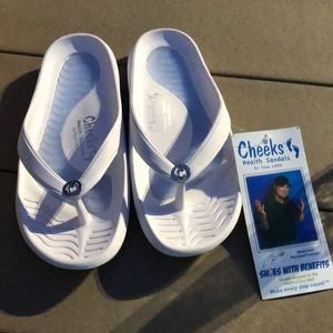 Tony Little Cheeks Flip Flops. Brand new. Sz 7